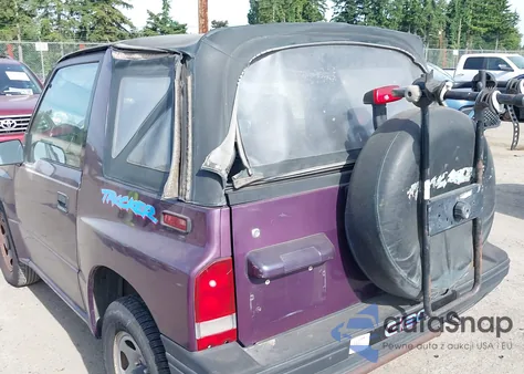 1995 Geo Tracker from USA, damaged, VIN 2CNBE18U9S6924854